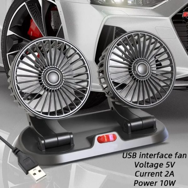 ventilator sive boje u garazi pored auta