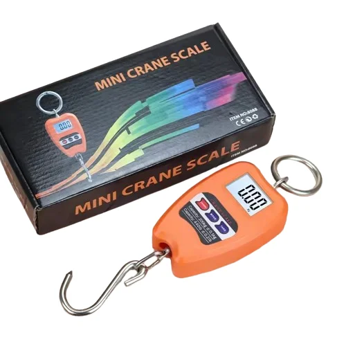 Digitalna viseća vaga sa LCD ekranom pored originalne kutije