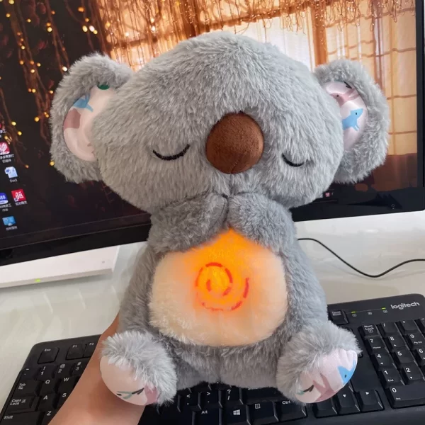 Plišani koala koji diše dok spava