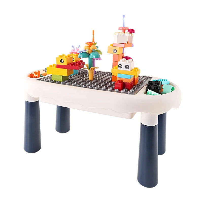 main-image-1 Dečiji sto za slaganje kockica i crtanje , na stolu se nalaze skloplenje kockice