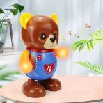 Plesni meda igračka btaon boje na stolu